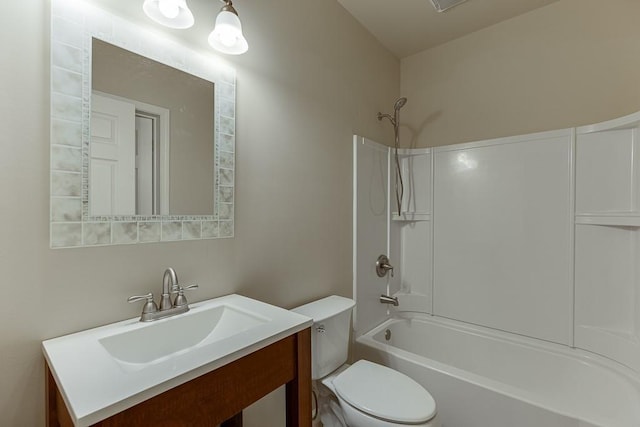 full bathroom with vanity, tub / shower combination, and toilet