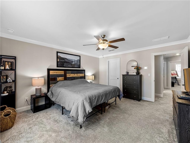 bedroom with light carpet, visible vents, and baseboards