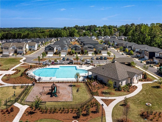 birds eye view of property with a residential view