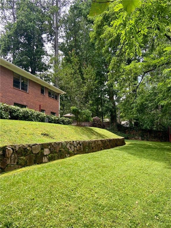 406 S Hillcrest Dr SW, Marietta, GA 30064 - view of green lawn with view of scattered trees