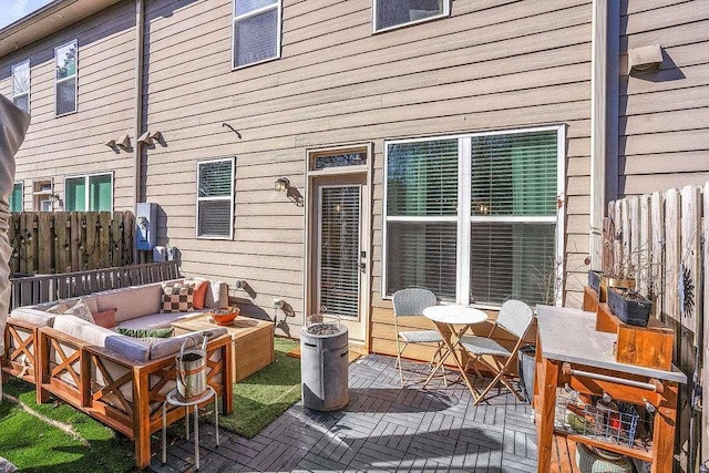 back of house featuring an outdoor hangout area and a patio area