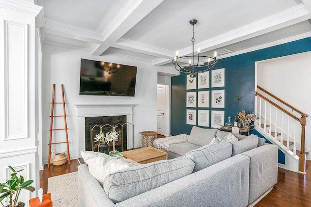 living room with beamed ceiling, coffered ceiling, dark wood-type flooring, and a fireplace