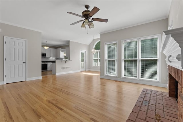 3642 Fowler Rdg, Douglasville, GA 30135 - unfurnished living room with a fireplace, a ceiling fan, light wood-style flooring, baseboards, and crown molding