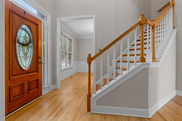3642 Fowler Rdg, Douglasville, GA 30135 - entryway featuring wood finished floors, ornamental molding, stairway, and baseboards