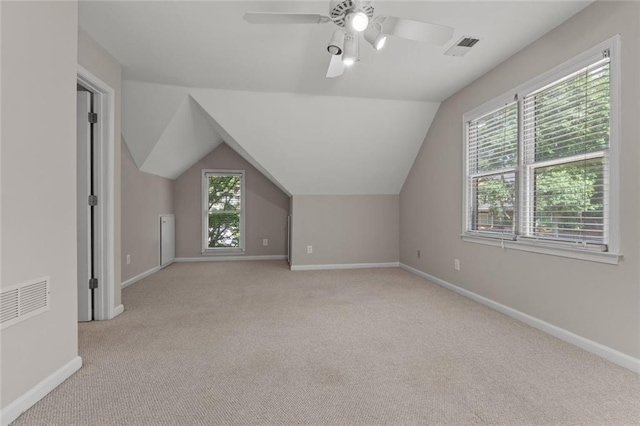 3642 Fowler Rdg, Douglasville, GA 30135 - bonus room featuring light colored carpet, baseboards, healthy amount of natural light, a ceiling fan, and lofted ceiling