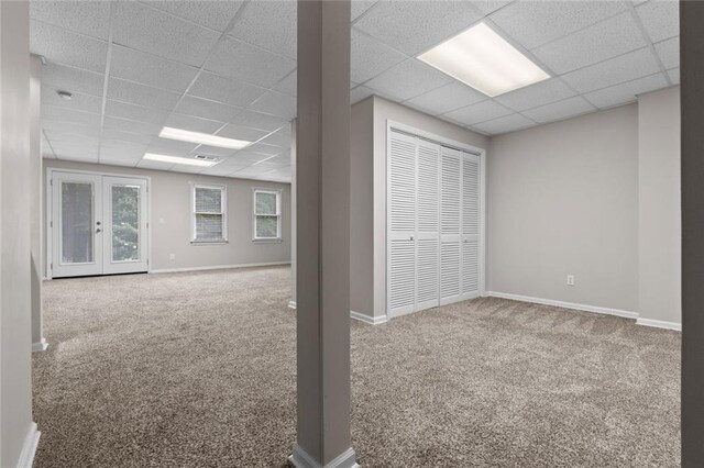 3642 Fowler Rdg, Douglasville, GA 30135 - below grade area with a drop ceiling, carpet, and baseboards