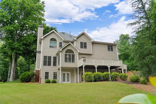 3642 Fowler Rdg, Douglasville, GA 30135 - rear view of property featuring french doors, a chimney, a yard, and a wooden deck