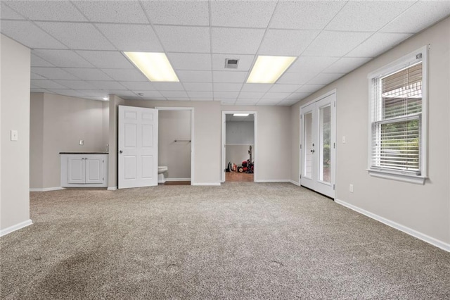 3642 Fowler Rdg, Douglasville, GA 30135 - carpeted spare room featuring a paneled ceiling and baseboards