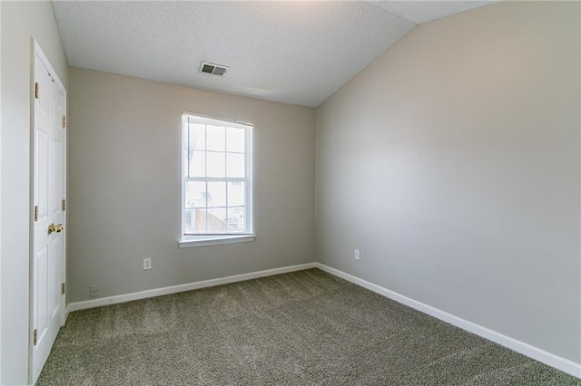 256 Turnstone Rd, Stockbridge, GA 30281 - carpeted spare room with baseboards and a textured ceiling