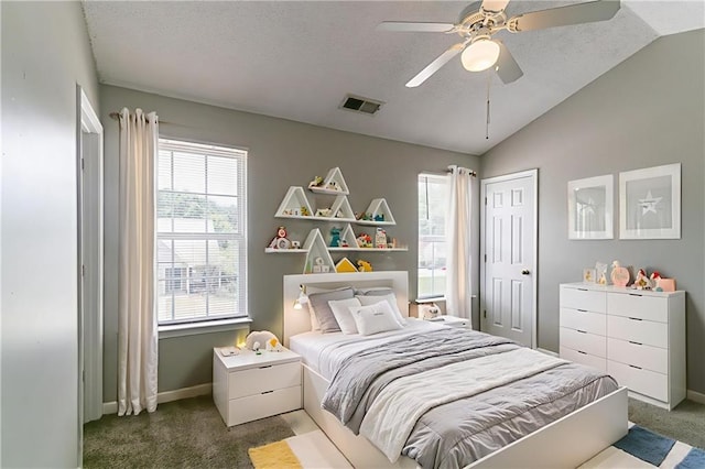 256 Turnstone Rd, Stockbridge, GA 30281 - carpeted bedroom with baseboards, lofted ceiling, a textured ceiling, and ceiling fan