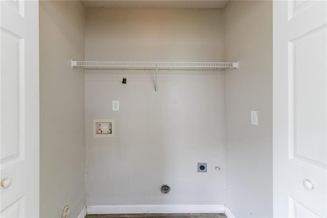 256 Turnstone Rd, Stockbridge, GA 30281 - laundry room featuring hookup for an electric dryer, hookup for a washing machine, baseboards, and hookup for a gas dryer