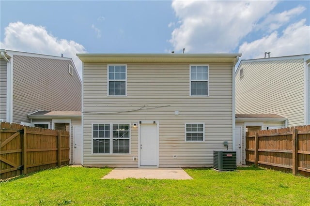 256 Turnstone Rd, Stockbridge, GA 30281 - rear view of house featuring central AC unit and a patio area