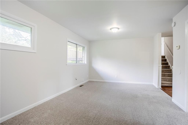 2110 Redbud Ct SW, Marietta, GA 30008 - empty room with carpet and stairs