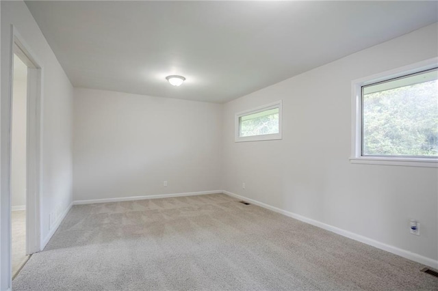 2110 Redbud Ct SW, Marietta, GA 30008 - spare room with light carpet and baseboards
