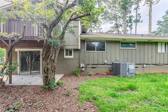 2110 Redbud Ct SW, Marietta, GA 30008 - rear view of house with a patio area and board and batten siding