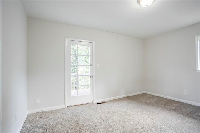 2110 Redbud Ct SW, Marietta, GA 30008 - carpeted empty room with baseboards