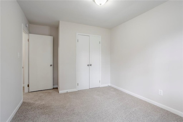 2110 Redbud Ct SW, Marietta, GA 30008 - unfurnished bedroom with carpet and a closet