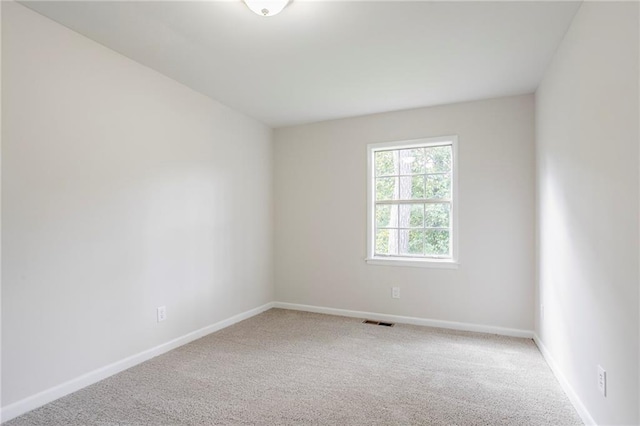 2110 Redbud Ct SW, Marietta, GA 30008 - carpeted spare room with baseboards