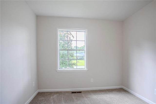 2110 Redbud Ct SW, Marietta, GA 30008 - spare room with carpet flooring and baseboards