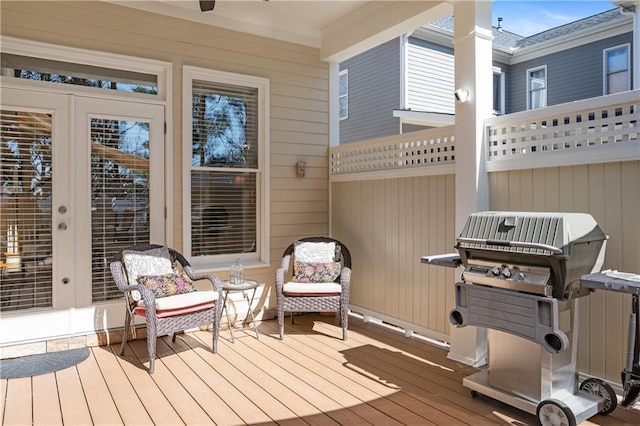 wooden terrace with area for grilling