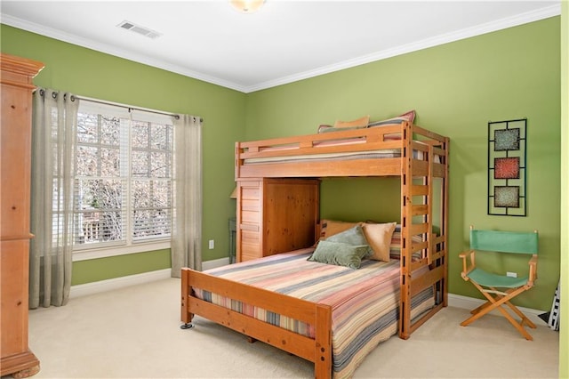 bedroom featuring visible vents, carpet floors, and crown molding