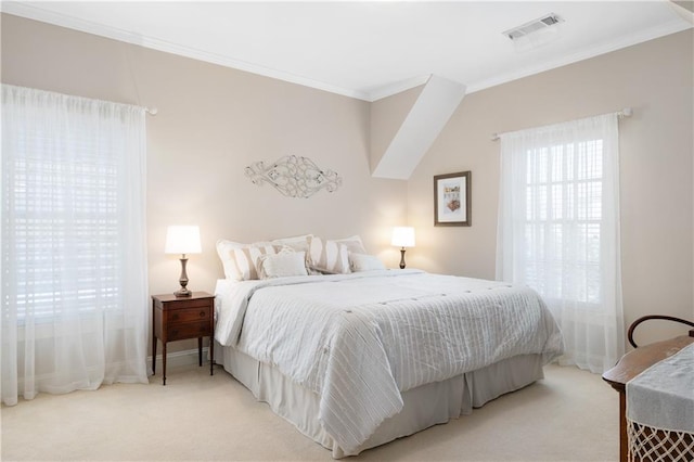 carpeted bedroom featuring crown molding and visible vents