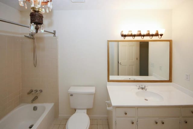 full bathroom with tile patterned flooring, vanity, toilet, and tiled shower / bath combo