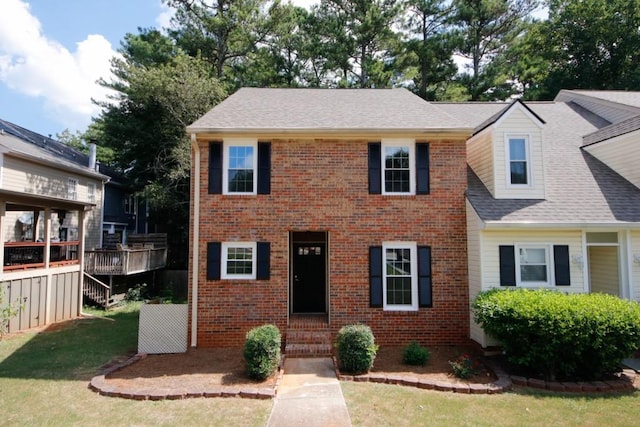 view of front of home with a front yard