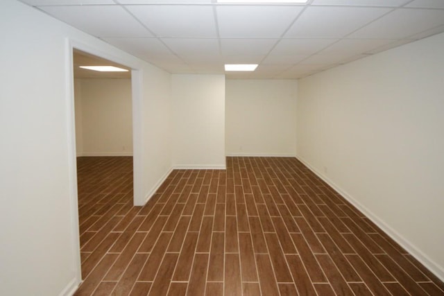 basement featuring a paneled ceiling