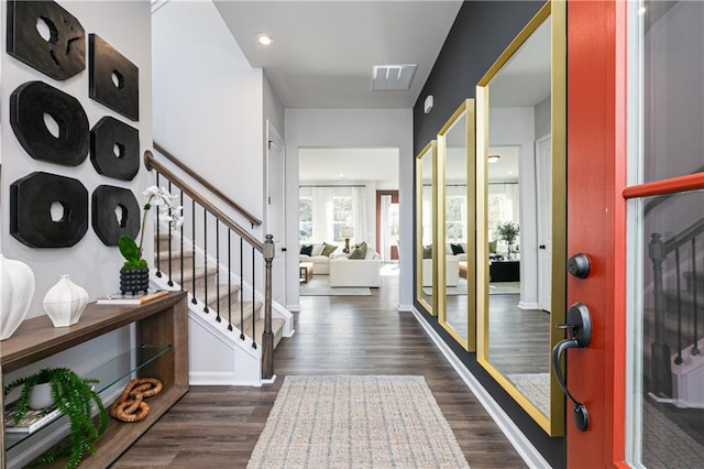 entrance foyer featuring dark wood-type flooring