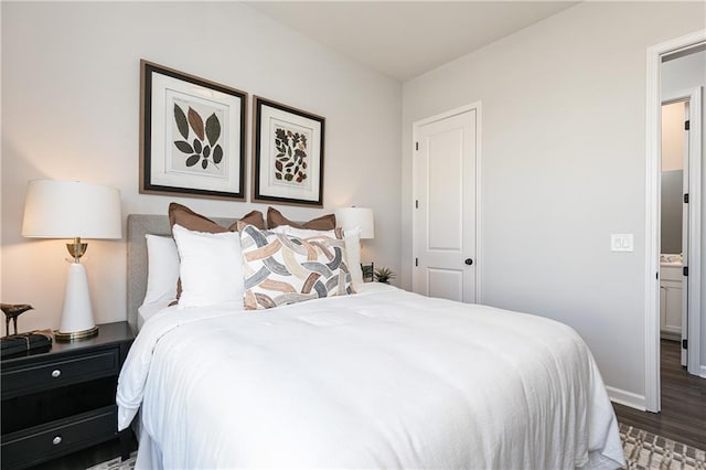 bedroom featuring wood-type flooring