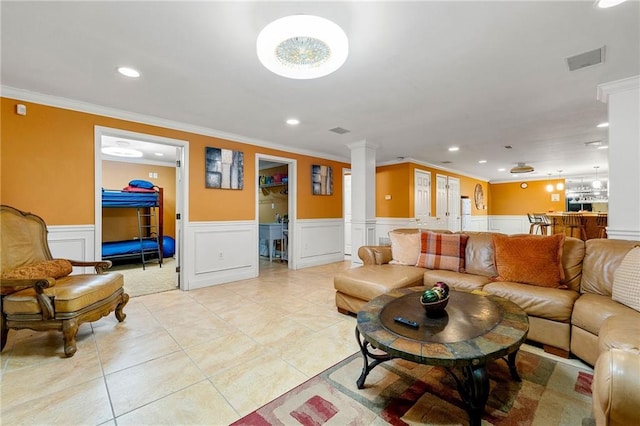 living room featuring recessed lighting, ornate columns, light tile patterned floors, visible vents, and wainscoting