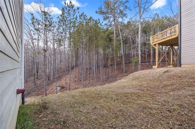 view of yard featuring a deck