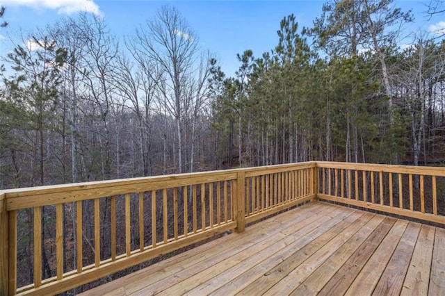 deck featuring a wooded view