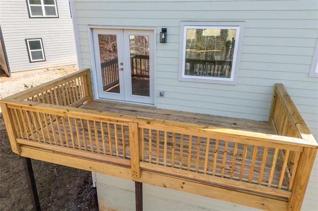 wooden deck featuring french doors