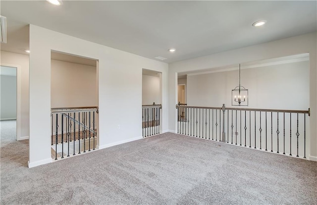 512 Dolce Rd, Locust Grove, GA 30248 - unfurnished room featuring a chandelier, carpet floors, baseboards, and recessed lighting