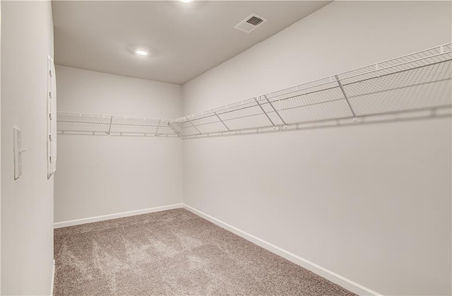 512 Dolce Rd, Locust Grove, GA 30248 - spacious closet featuring carpet flooring and visible vents