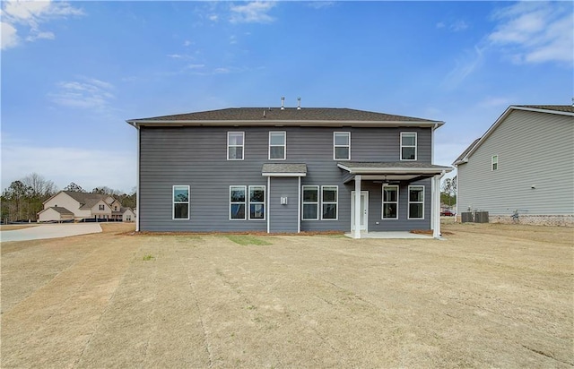 512 Dolce Rd, Locust Grove, GA 30248 - back of property featuring ceiling fan, a patio area, and central AC