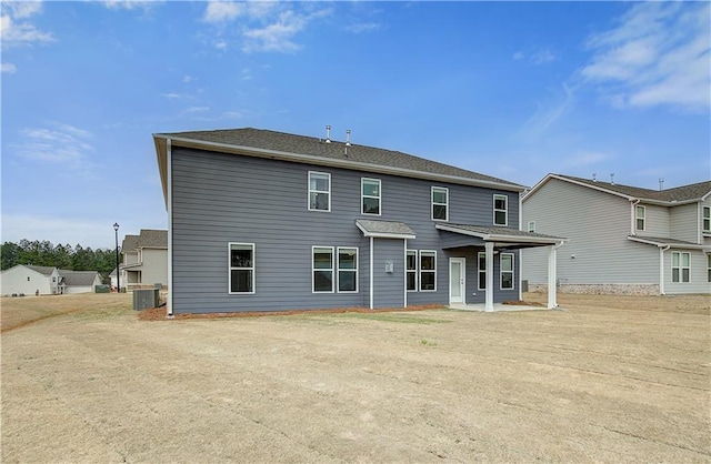 512 Dolce Rd, Locust Grove, GA 30248 - rear view of house with central AC unit