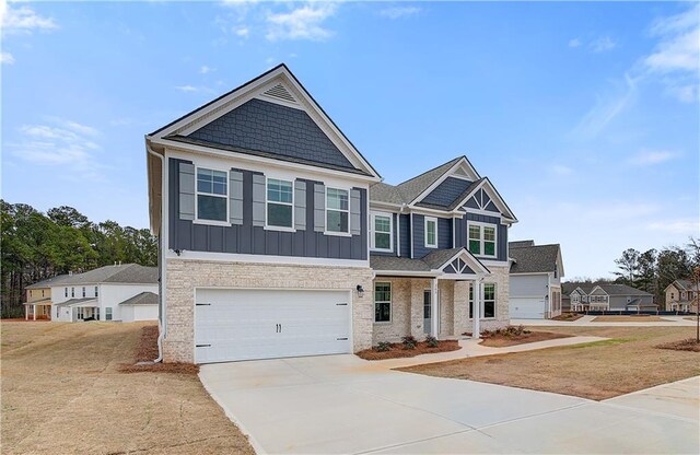 512 Dolce Rd, Locust Grove, GA 30248 - craftsman-style home featuring board and batten siding, driveway, and a garage
