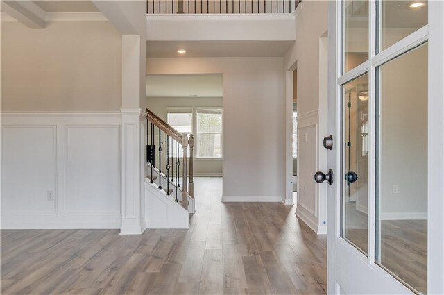 512 Dolce Rd, Locust Grove, GA 30248 - entryway with stairway, a decorative wall, recessed lighting, and wood finished floors