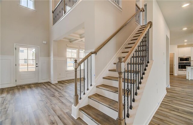 512 Dolce Rd, Locust Grove, GA 30248 - foyer with a wealth of natural light, stairway, and light wood finished floors