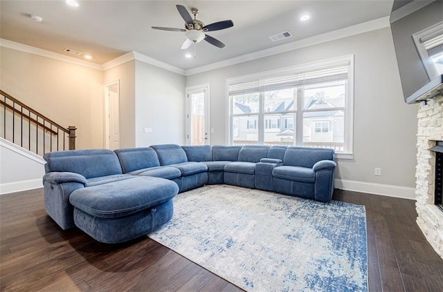 10035 River Rock Dr, Roswell, GA 30076 - living area featuring plenty of natural light, a stone fireplace, a ceiling fan, recessed lighting, and dark wood finished floors