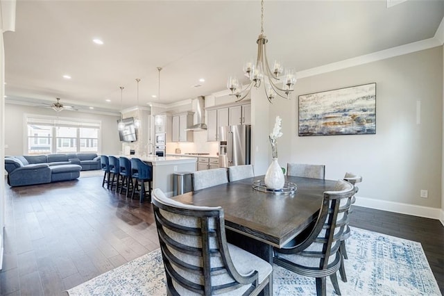 10035 River Rock Dr, Roswell, GA 30076 - dining area featuring a chandelier, crown molding, dark wood-style floors, recessed lighting, and a ceiling fan