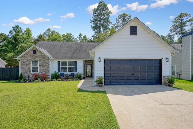 ranch-style home with a front lawn and a garage