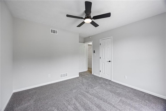 unfurnished bedroom with visible vents, baseboards, and carpet floors