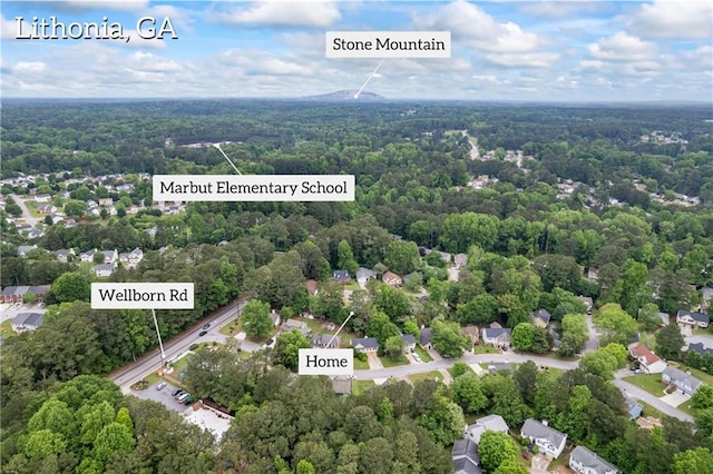 bird's eye view with a view of trees