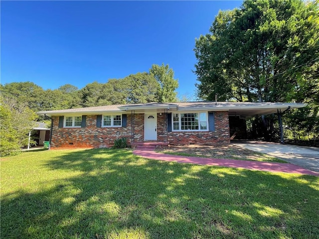 single story home featuring a carport and a front yard