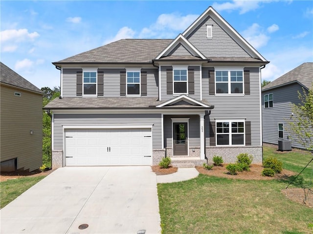392 Brookstone Trl, Dawsonville, GA 30534 - craftsman inspired home with an attached garage, brick siding, central AC, and a front yard