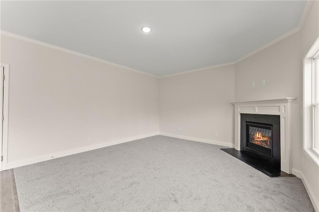 392 Brookstone Trl, Dawsonville, GA 30534 - unfurnished living room with crown molding, carpet floors, baseboards, recessed lighting, and a fireplace with flush hearth